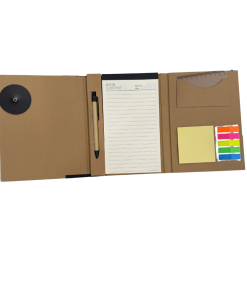 Open brown cardboard-style portfolio notebook with a lined notepad, matching pen, sticky notes, colorful page tabs, and a small ruler stored in interior pockets.