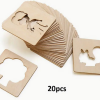 Set of 20 wooden stencil cards with animal-shaped cutouts including a tree, squirrel, and other designs, shown fanned out against a white background.