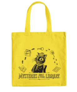 Bright yellow reusable tote bag featuring black illustrations of Inspector Whiskers holding a magnifying glass, surrounded by detective-themed clues.