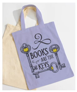 Lavender cotton tote bag reading "Books Are the Keys" with three ornate antique keys featuring open-book designs