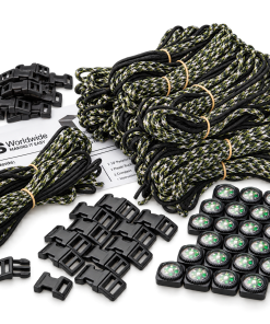 Product photo of paracord bracelet-making kits featuring bundles of black, green, and white camouflage cord, black plastic buckles, small compasses, and instruction sheets arranged on a white background.