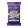 Purple Mysteries Await at Your Library trading card pack featuring Laurie Conley's black-and-white mystery investigation board artwork, with photographs and clues connected by red string. Candles, books, a magnifying glass, and a skull surround the scene. The bottom reads “Collect | Trade | Discover.”