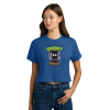 Model wearing a royal blue cropped T-shirt featuring the “Spooky Story Club” design with bright green and orange lettering and a black, wide-eyed ghostly character surrounded by bookshelves. Paired with blue jeans against a white background.